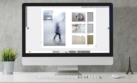 Desktopcomputer met afbeelding van interactieve catalogus.
