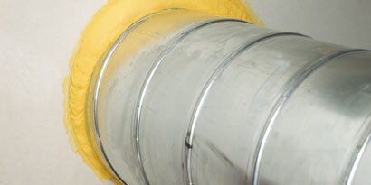 Afbeelding van HVAC bevestigd aan een wand
